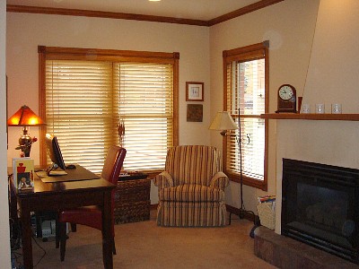 Master bedroom office/sitting area. Mountain & town ski runs view from windows.