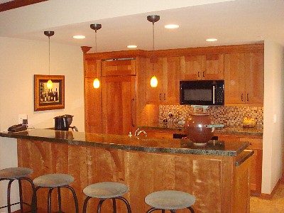 Bar and kitchen. Accent lighting throughtout.
